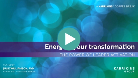 Presentation slide with a teal bokeh background, titled "Energize your transformation: The Power of Leader Activation,” hosted by Julie Williamson, PhD. Includes Karrikins Group logos and a play button overlay.